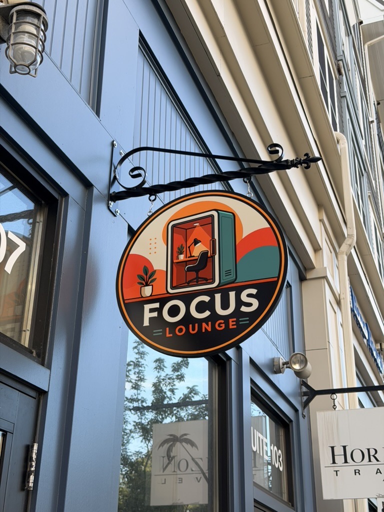 Focus Lounge hanging sign in Downtown Storrs